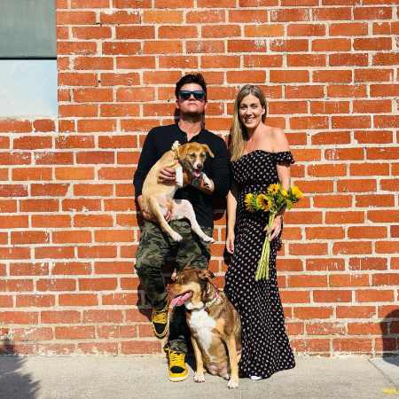 Steven Grayhm and his wife with their two dogs.
